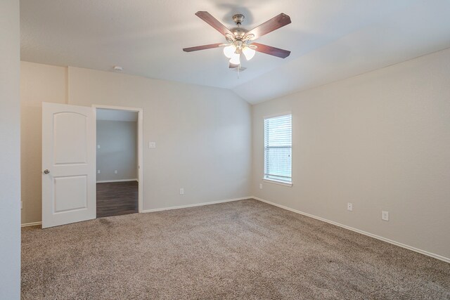 15459 Refugio Verde Way, Houston, TX 77049 - unfurnished room with baseboards, ceiling fan, carpet, and vaulted ceiling