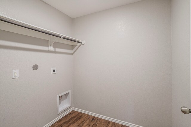15459 Refugio Verde Way, Houston, TX 77049 - clothes washing area featuring baseboards, dark wood finished floors, visible vents, laundry area, and electric dryer hookup