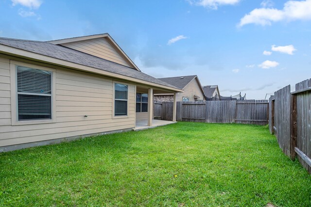 15459 Refugio Verde Way, Houston, TX 77049 - view of yard featuring a patio area and a fenced backyard