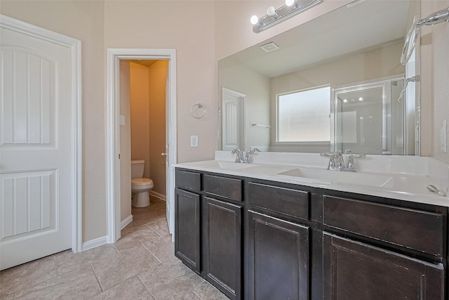 25451 Dappled Filly Dr, Tomball, TX 77375 - full bathroom with a sink, a stall shower, toilet, and double vanity