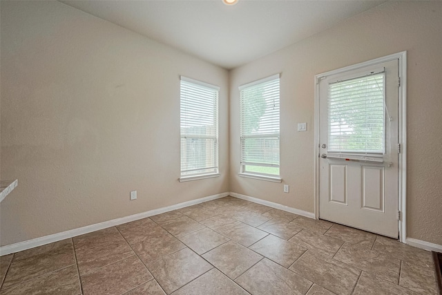 25451 Dappled Filly Dr, Tomball, TX 77375 - doorway featuring baseboards