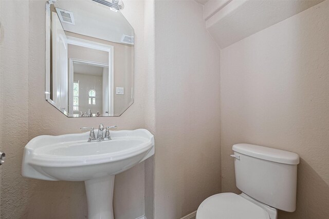 25451 Dappled Filly Dr, Tomball, TX 77375 - half bath with visible vents, a sink, and toilet