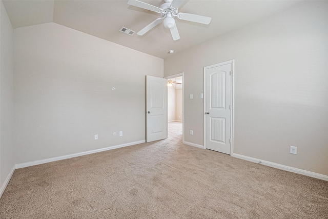 25451 Dappled Filly Dr, Tomball, TX 77375 - unfurnished bedroom featuring light colored carpet, a ceiling fan, baseboards, vaulted ceiling, and visible vents