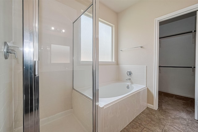 25451 Dappled Filly Dr, Tomball, TX 77375 - full bath with a shower stall, a bath, and a spacious closet