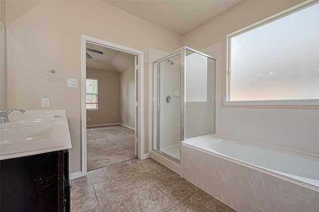25451 Dappled Filly Dr, Tomball, TX 77375 - bathroom with ceiling fan, a shower stall, a garden tub, and vanity