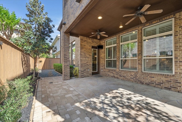 view of patio / terrace with a fenced backyard and ceiling fan