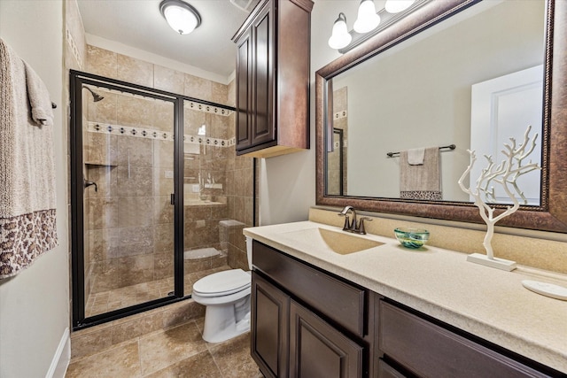 full bath featuring vanity, stone finish floor, a stall shower, and toilet