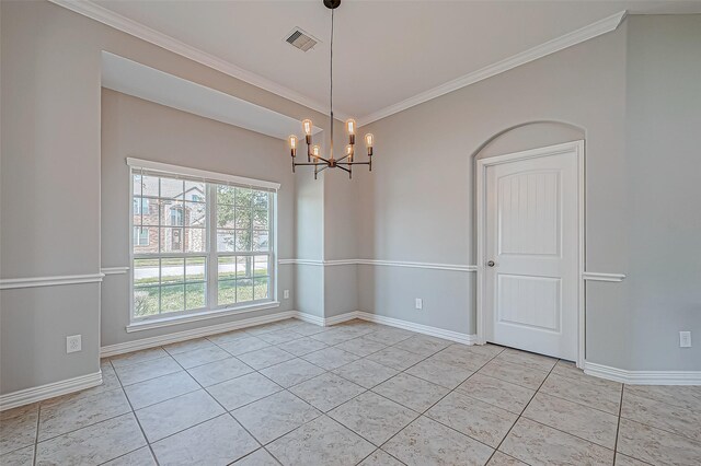 unfurnished room with a chandelier, visible vents, ornamental molding, and light tile patterned floors