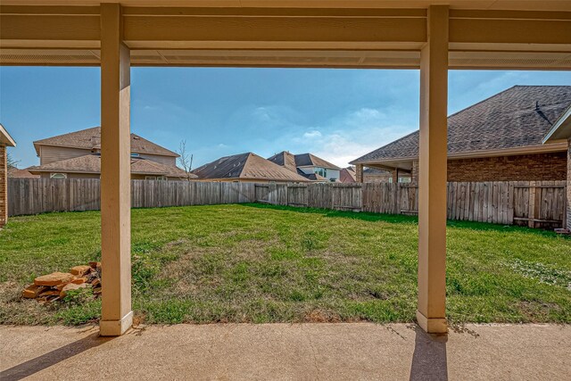 view of yard with a fenced backyard and a patio area