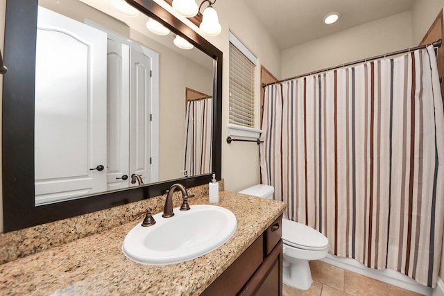 5341 Nolda St Unit E, Houston, TX 77007 - bathroom with toilet, tile patterned floors, vanity, and curtained shower