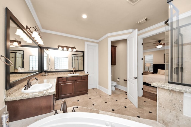 5341 Nolda St Unit E, Houston, TX 77007 - bathroom featuring toilet, ceiling fan, visible vents, and a sink
