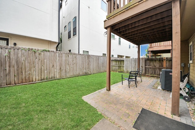 5341 Nolda St Unit E, Houston, TX 77007 - view of yard featuring central AC, a patio, and a fenced backyard