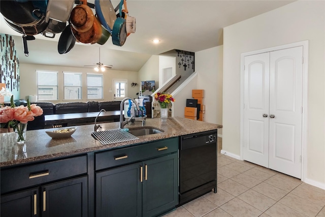 9530 Tipton Sands Dr, Humble, TX 77396 - kitchen with a sink, light tile patterned floors, black dishwasher, and dark stone counters
