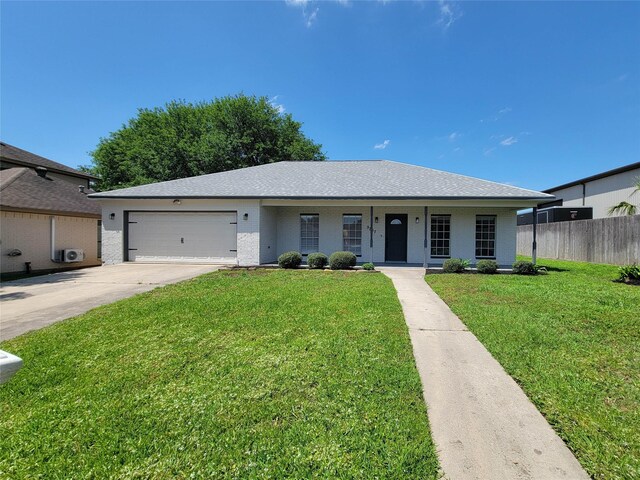 ranch-style house featuring a garage, fence, covered porch, a front yard, and driveway