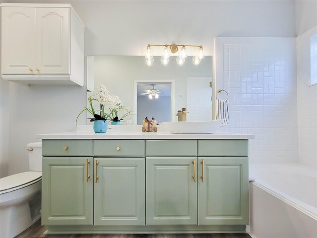 full bathroom featuring vanity, ceiling fan, and toilet