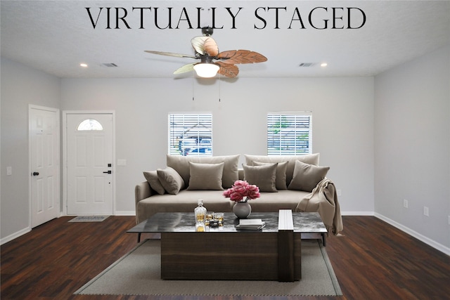 living room with recessed lighting, baseboards, visible vents, and dark wood-type flooring