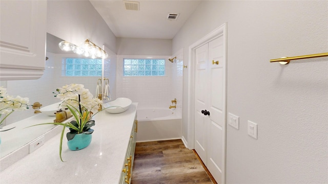 9267 Inlet Cir, Montgomery, TX 77356 - bathroom featuring wood finished floors, bathtub / shower combination, and vanity