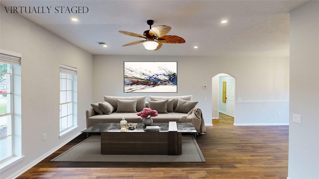 9267 Inlet Cir, Montgomery, TX 77356 - living room with arched walkways, wood finished floors, ceiling fan, recessed lighting, and baseboards