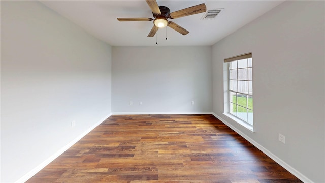 9267 Inlet Cir, Montgomery, TX 77356 - unfurnished room featuring a ceiling fan, wood finished floors, and baseboards