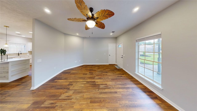 9267 Inlet Cir, Montgomery, TX 77356 - empty room featuring recessed lighting, a ceiling fan, dark wood-type flooring, and baseboards