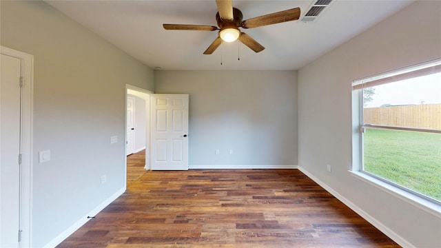9267 Inlet Cir, Montgomery, TX 77356 - empty room with a ceiling fan, wood finished floors, and baseboards