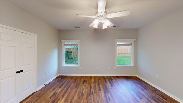 9267 Inlet Cir, Montgomery, TX 77356 - unfurnished bedroom featuring wood finished floors, baseboards, and ceiling fan