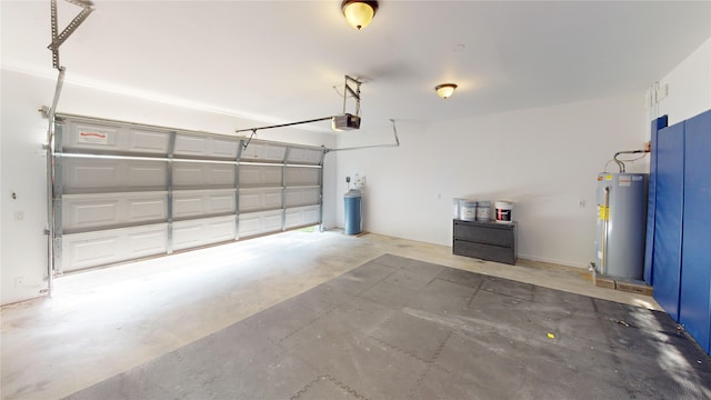 9267 Inlet Cir, Montgomery, TX 77356 - garage with electric water heater and a garage door opener