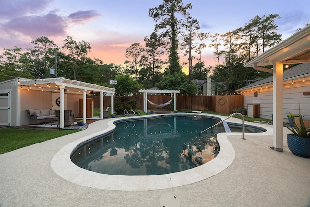 view of pool featuring a fenced backyard, a fenced in pool, a pergola, and an outdoor living space