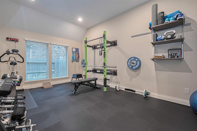 exercise area with recessed lighting, baseboards, and lofted ceiling
