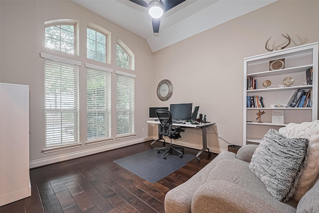 office featuring a ceiling fan, baseboards, wood finished floors, and lofted ceiling