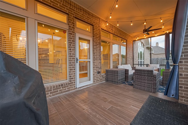 exterior space with a ceiling fan and an outdoor hangout area