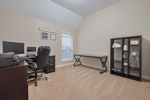 office area with baseboards, carpet flooring, and vaulted ceiling