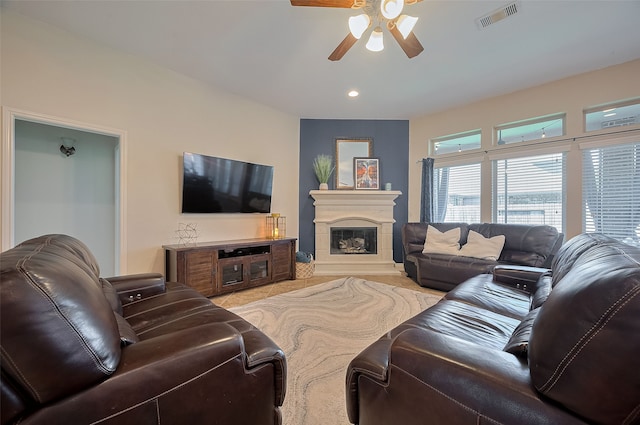 11918 Forest Moon Dr, Cypress, TX 77433 - living room featuring a ceiling fan, a glass covered fireplace, and recessed lighting