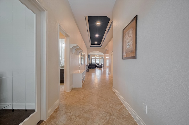 11918 Forest Moon Dr, Cypress, TX 77433 - hall featuring arched walkways and baseboards