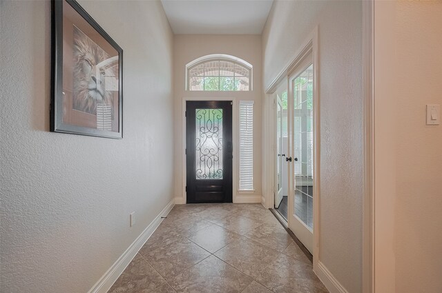 11918 Forest Moon Dr, Cypress, TX 77433 - entrance foyer featuring baseboards and a textured wall