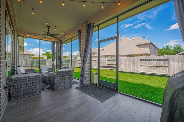 11918 Forest Moon Dr, Cypress, TX 77433 - sunroom / solarium featuring ceiling fan, outdoor lounge area, and a residential view