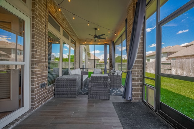 11918 Forest Moon Dr, Cypress, TX 77433 - sunroom with track lighting, a ceiling fan, and an outdoor living space