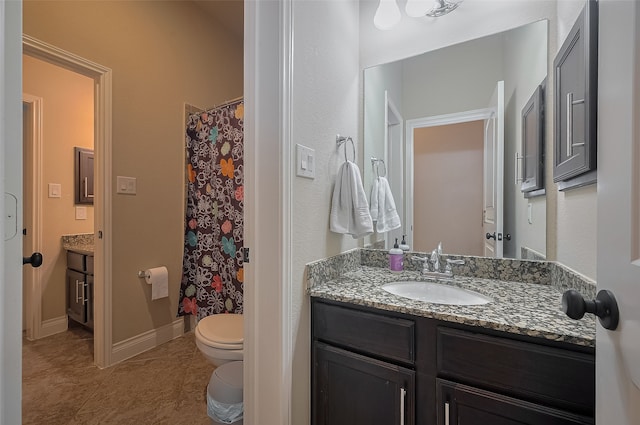 11918 Forest Moon Dr, Cypress, TX 77433 - full bathroom featuring vanity, tile patterned flooring, toilet, and a shower with curtain
