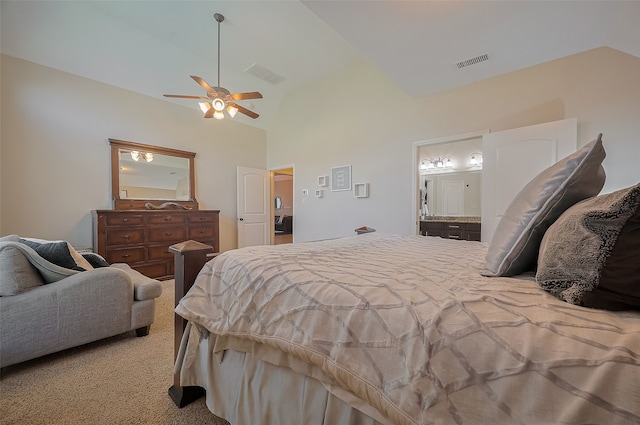 11918 Forest Moon Dr, Cypress, TX 77433 - bedroom featuring vaulted ceiling, ensuite bath, ceiling fan, and light carpet