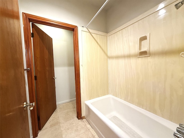7110 W Mockingbird Ln, Pearland, TX 77584 - bathroom with tile patterned floors and baseboards