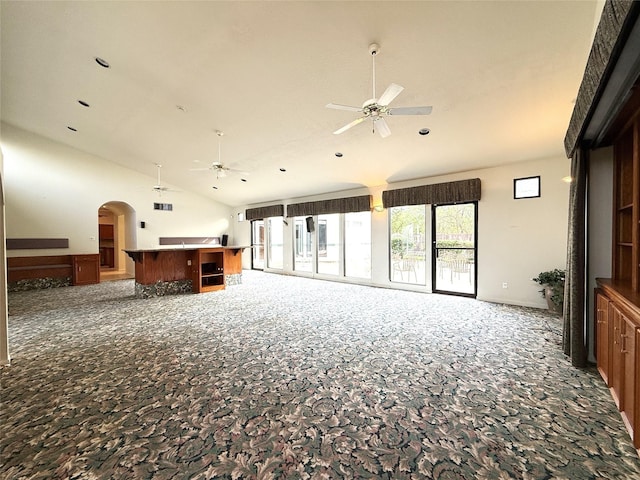 7110 W Mockingbird Ln, Pearland, TX 77584 - unfurnished living room with a ceiling fan, arched walkways, recessed lighting, and high vaulted ceiling