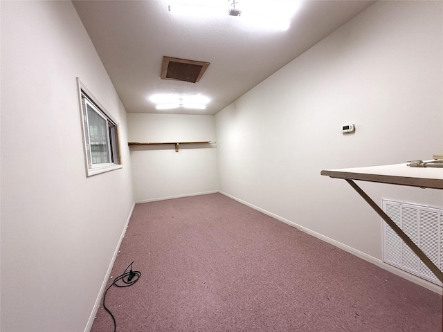 7110 W Mockingbird Ln, Pearland, TX 77584 - spacious closet featuring carpet flooring
