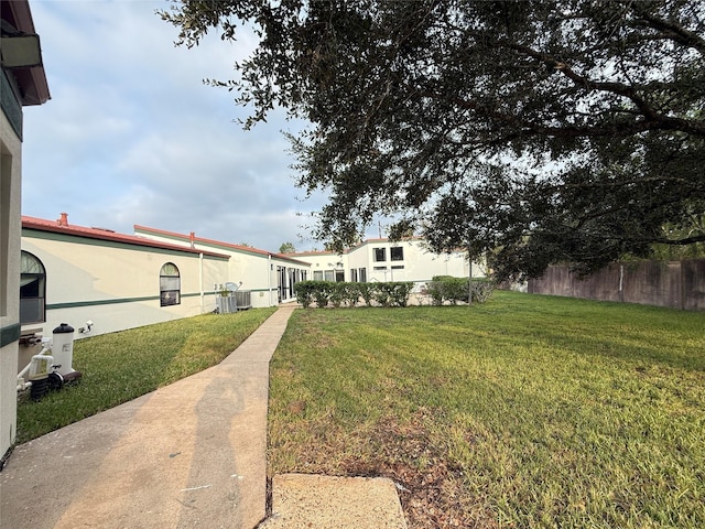 7110 W Mockingbird Ln, Pearland, TX 77584 - view of yard featuring cooling unit