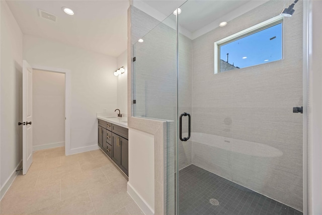 full bathroom with a sink, tile patterned flooring, recessed lighting, visible vents, and a stall shower