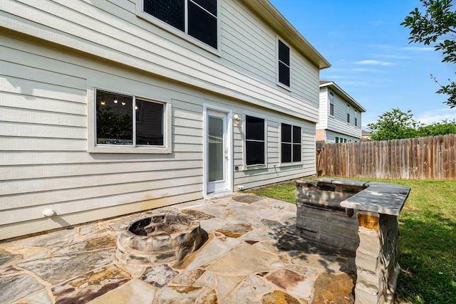 19627 Lighthouse Scene Ln, Cypress, TX 77433 - view of patio / terrace featuring a fire pit and fence