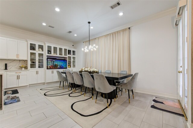 dining room featuring crown molding, recessed lighting, a notable chandelier, and visible vents
