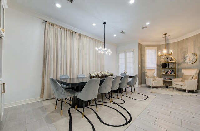 dining area with an inviting chandelier, ornamental molding, visible vents, baseboards, and recessed lighting