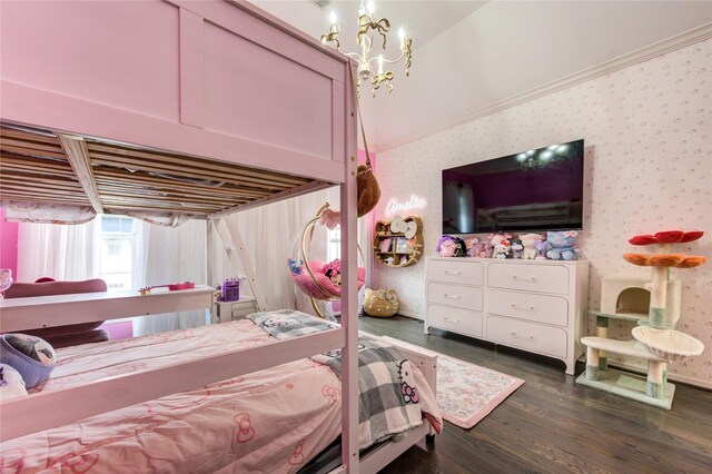 bedroom with crown molding, a notable chandelier, wallpapered walls, lofted ceiling, and dark wood-type flooring