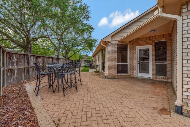 3515 Emerald Falls Ct, Houston, TX 77059 - view of patio / terrace with a fenced backyard and outdoor dining area