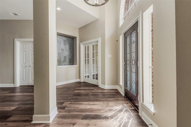3515 Emerald Falls Ct, Houston, TX 77059 - foyer entrance featuring dark wood finished floors, french doors, baseboards, and a chandelier
